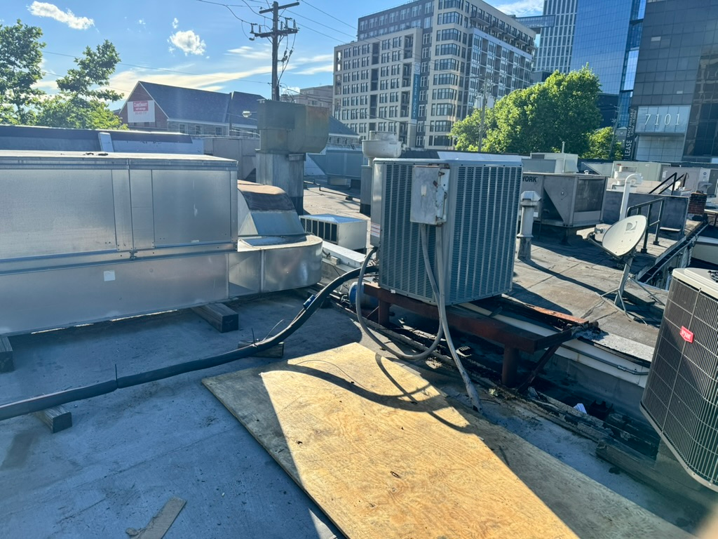 Commercial rooftop HVAC equipment and condenser units serviced by Potomac HVAC in the Potomac area.